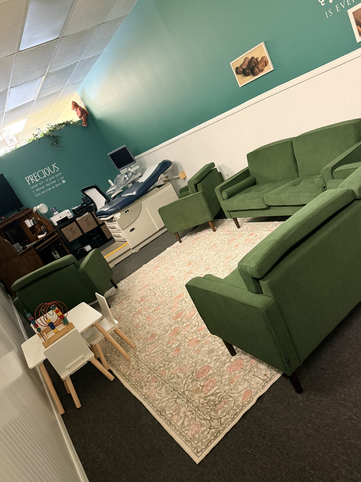 Comfortable private ultrasound suite with seating for family